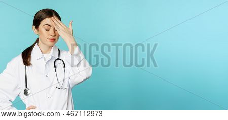 Portrait Of Annoyed, Tired Woman Doctor, Facepalm, Roll Eyes Frustrated, Bothered By Smth Stupid, St