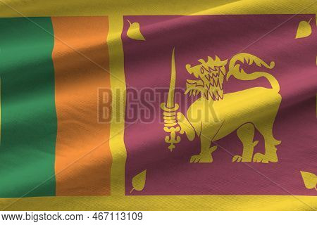 Sri Lanka Flag With Big Folds Waving Close Up Under The Studio Light Indoors. The Official Symbols A