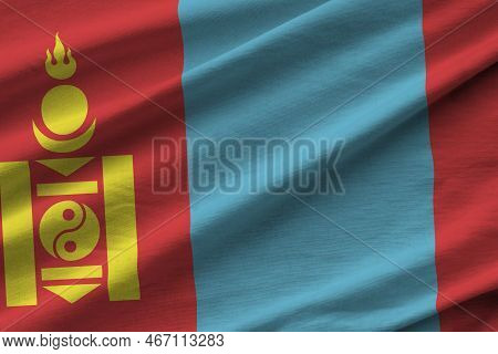 Mongolia Flag With Big Folds Waving Close Up Under The Studio Light Indoors. The Official Symbols An