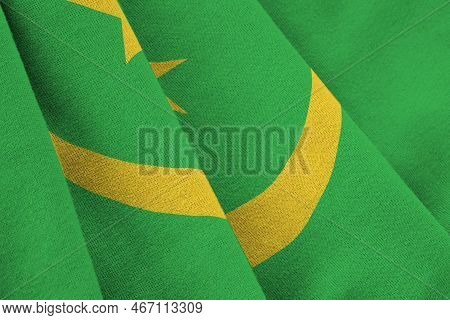 Mauritania Flag With Big Folds Waving Close Up Under The Studio Light Indoors. The Official Symbols 