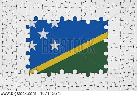 Solomon Islands Flag In Frame Of White Puzzle Pieces With Missing Central Parts