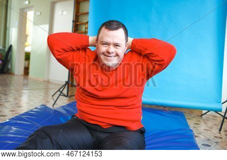 An Adult Man With A Syndrome Of Mental Deviation Is Engaged In Sports.