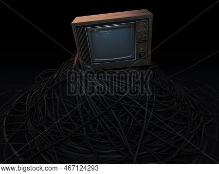A Vintage 80's Television Perched On A Jumbled Pile Of Black Cables On A Dark Omnious Background - 3