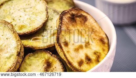 Pot Of Fried Or Baked Sweet Potatoes, Sliced ​​and Served Hot, Typical Food From Brazil
