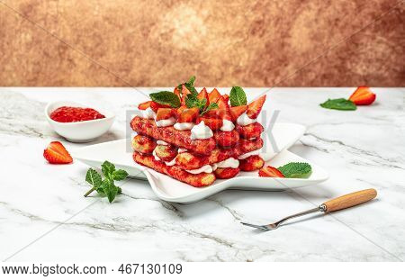 Tiramisu. Homemade Tiramisu Cake With Fresh Strawberry, Mascarpone And Mint. Tiramisu Portion On Pla