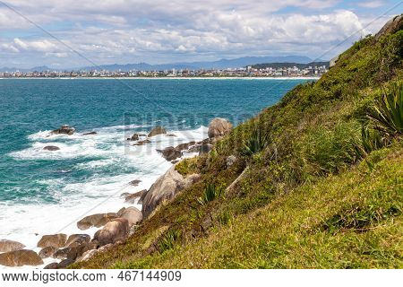 Vegetation And Waves With Canto Grande Beach In Background, Bombinhas, Santa Catarina, Brazil