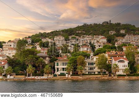 View Of The Mountains Of Kinaliada Island From Marmara Sea, With Traditional Summer Houses And Boats