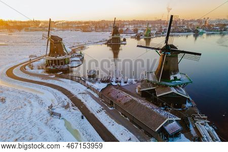 Zaanse Schans Windmill Village During Winter With Snow Landscape In The Netherlands