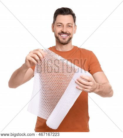 Man Holding Roll Of Bubble Wrap On White Background. Stress Relief