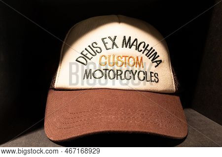 Bordeaux , Aquitaine France - 12 12 2022 : Deus Custom Motorcycles Cap In The Store With Logo Brand 