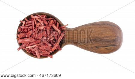 Red Sandalwood Incense Chips In Wooden Spoon, Isolated On White Background. Sanderswood, Rubywood Or