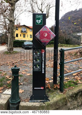 Argegno-lombardia-italy - December 13, 2022 - Automated External Defibrillator (aed) At Street Aid S