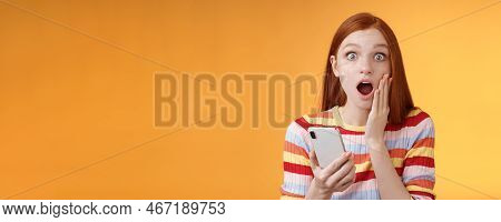 Concerned Shocked Emotive Redhead Girl Find Out Stunning News Look Camera Drop Jaw Gasping Impressed