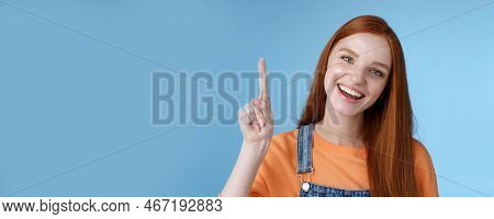 Lively Active Energized Happy Smiling Hepful Redhead Female Coworker Showing You Awesome Promo Point