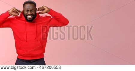 Annoyed Bothered Uncomfortable Young African-american Pressured And Stressed Bearded Guy Clench Teet