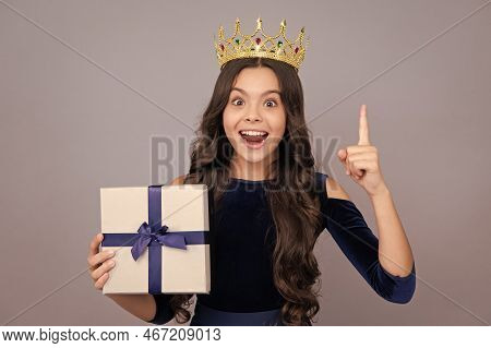 Excited Teenager Girl Princess In Crown. Teenager Kid With Present Box. Teen Girl Giving Birthday Gi