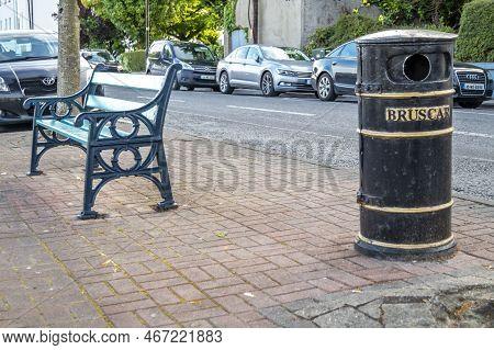 Ballina, County Mayo, Ireland - August 01 2022 : Bin And Bench Standing In Ballina Town.