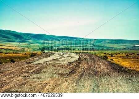Almaty, Kazakhstan - June 16 2017 : Beautiful Landscape Of Steppe And Stone Mountains Along The Road