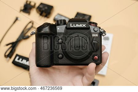 Paris, France - Nov 20, 2022: Male Photographer Hand Holding New Panasonic Lumix Dmc-gh6 Micro Four 