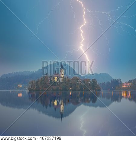 Astonishing Night  View Of Popular Tourist Destination  Bled Lake. Dramatic View Of Pilgrimage Churc