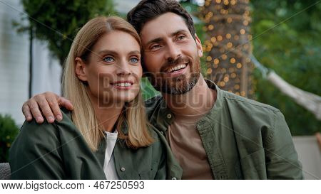 Loving Married Couple Husband And Wife Caucasian Bearded Man And Blonde Woman 40s Spouses Sit Outdoo