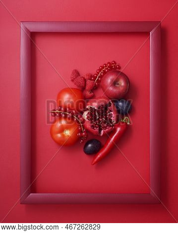 Red Fruits, Berries And Vegetables In Wooden Picture Frame