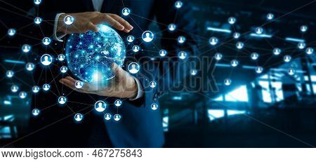 Businessman Holding Global Customer Network Connection In Hands.technology  And Structure Networking