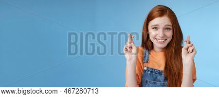 Silly Young Pretty Redhead Girl Blue Eyes Freckles Making Wish Cross Fingers Good Luck Smiling Hopef