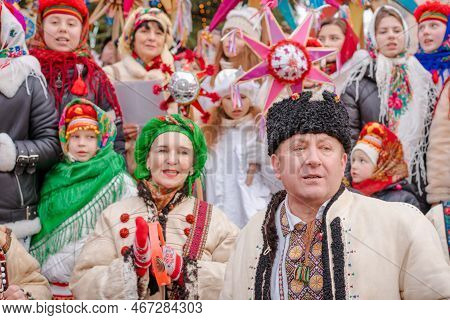 Lviv, Ukraine - January 8, 2022 : Ukrainian Vertep Singing Carols And Traditional Christmas Stars Fe