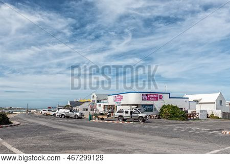 Lagulhas, South Africa - Sep 21, 2022: A Street Scene, With Businesses, And Vehicles, In Lagulhas In