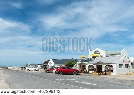 Lagulhas, South Africa - Sep 21, 2022: A Street Scene, With Businesses, And Vehicles, In Lagulhas In