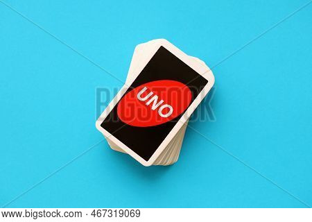 Ternopil, Ukraine - May 15, 2022: Many Colorful Uno Game Cards On Blue Background Close Up. Uno Is A