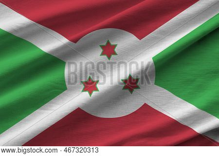 Burundi Flag With Big Folds Waving Close Up Under The Studio Light Indoors. The Official Symbols And