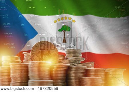 Equatorial Guinea Flag And Big Amount Of Golden Bitcoin Coins And Trading Platform Chart. Crypto Cur
