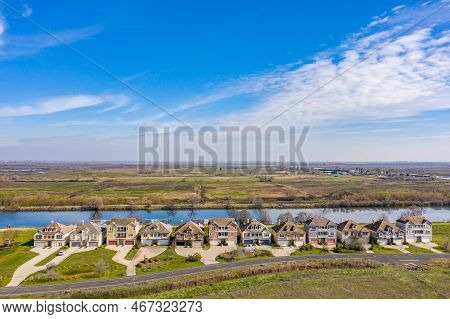 Oakley, California Usa 02 15 2020: A Row Of Vacant Homes In Oakley, California With A Water Tract In