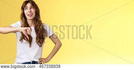 Blah Blah Boring. Unimpressed Apathetic Snobbish Attractive Curly-haired Girl Look Away Express Scor