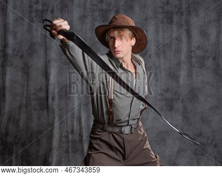 Treasure Hunter, A Hero Of A Retro-style Adventure. A Young Man In A Hat And Breeches With Suspender