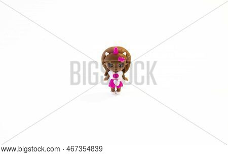 Doll Black, African American, Negroid Girl On A White Background, Isolated Object
