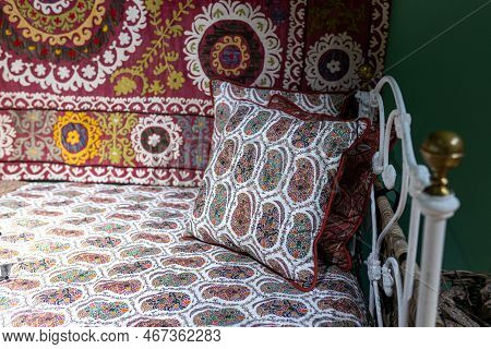 London - November 30, 2022: Liberty's, Luxury Department Store. Interior With A Bed, A Red Patchwork