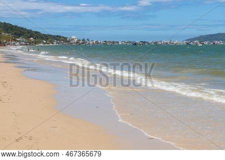 Sand And Waves In Zimbros Beach