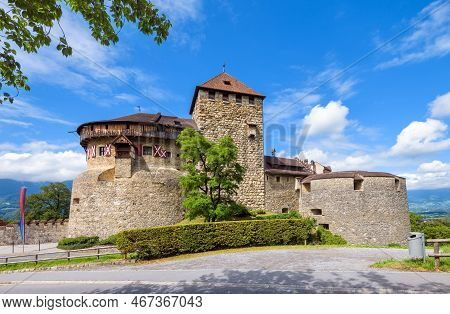 Vaduz Castle In Liechtenstein, Europe. Scenic View Of Old Royal Vaduz Residence And Blue Sky. Scener