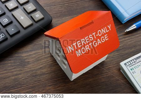 Model Of House With Sign Interest Only Mortgage.