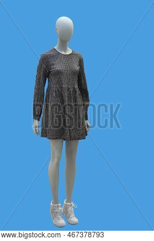 Full Length Image Of A Female Display Mannequin Wearing Fashionable Collarless Grey Long Sleeved Che