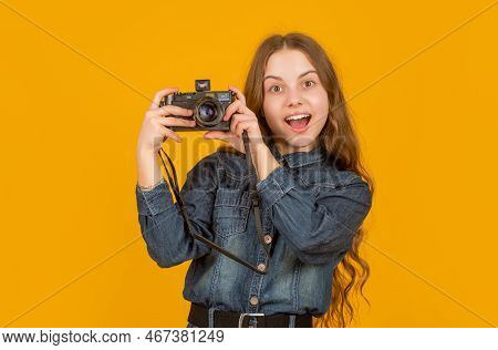 Looking Surprised. Surprised Teenage Photographer Holding Camera. Surprise