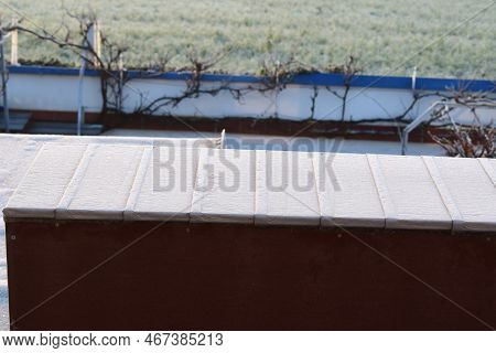 Thin Ice On A Dark Small Roof