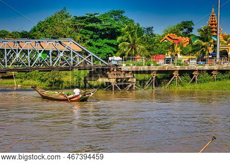 Yangon, Myanmar - December 03 2012 : Transport Of Many People In A Long Tailed Boat On A  Yangon Mya