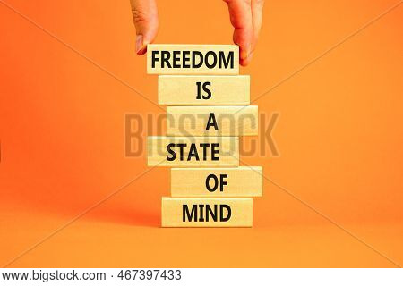 Freedom In Mind Symbol. Concept Words Freedom Is A State Of Mind On Wooden Blocks On A Beautiful Ora