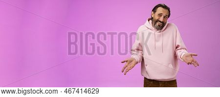 Portrait Doubtful Unsure Awkward Mature Man Shrugging Spread Hands Sideways Clueless Cringing Frowni
