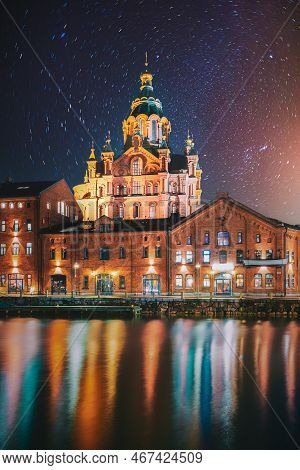 Helsinki, Finland. Bright Starry Rotation Sky. View Of Kanavaranta Street With Uspenski Cathedral In