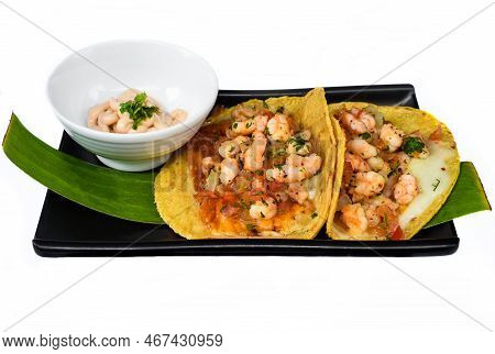 La Viga Tacos With Shrimps And Mexican Sauce On Black Plate Isolated On White Background